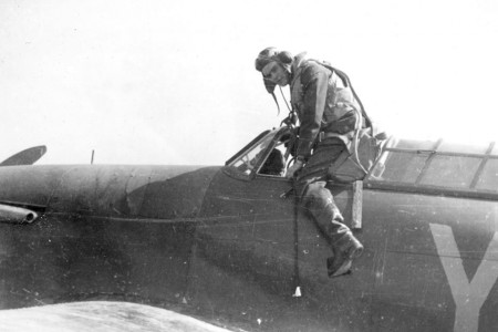 A pilot of No.1 Squadron climbs out of his plane after a sortie knowing full  well that he will be fighting in the skies again before the day is out