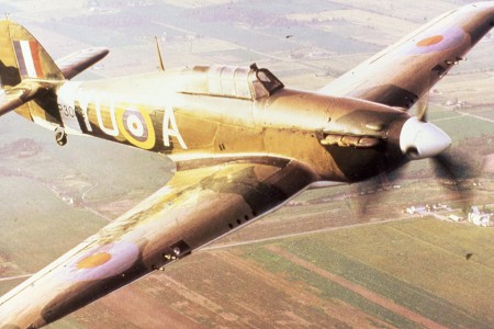 A rare colour photograph of a Hurricane of  No.1 Squadron RCAF over the south of England